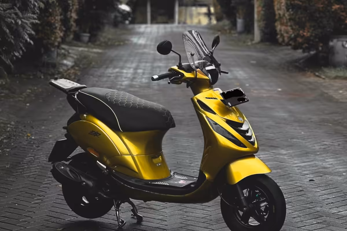 Close-up detail of hand-stitched custom Vespa seat pattern