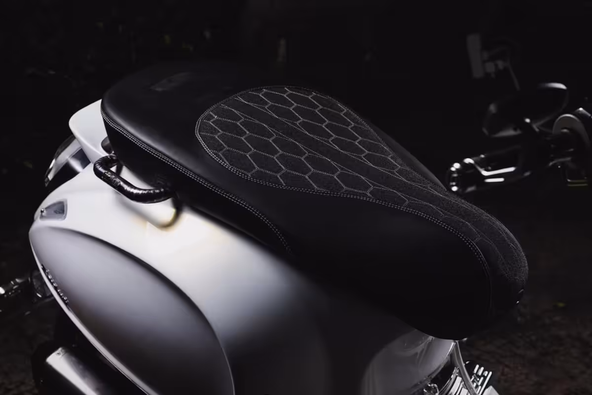 Custom Vespa seat blending traditional motifs with modern urban style