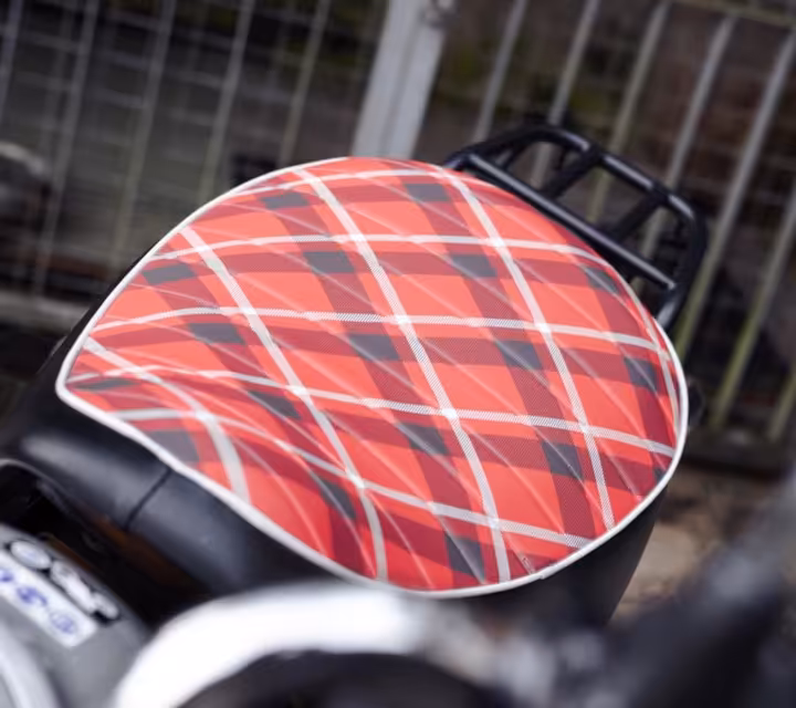 Ergonomic custom Vespa seat designed for long-distance comfort